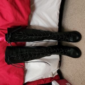 Knee high lace up tall boots